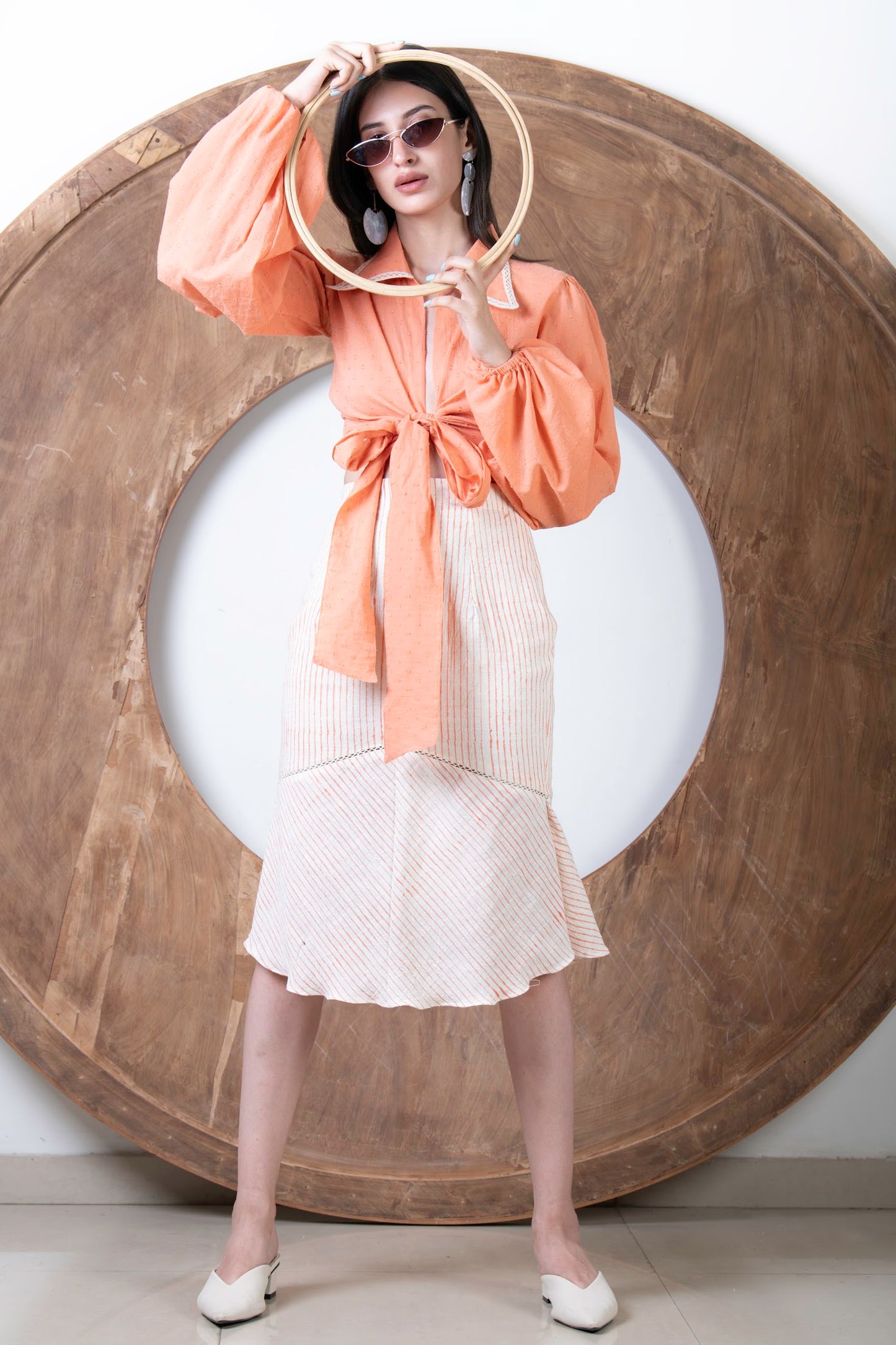 ORANGE BOW TOP WITH ASYMTERCAL SKIRT