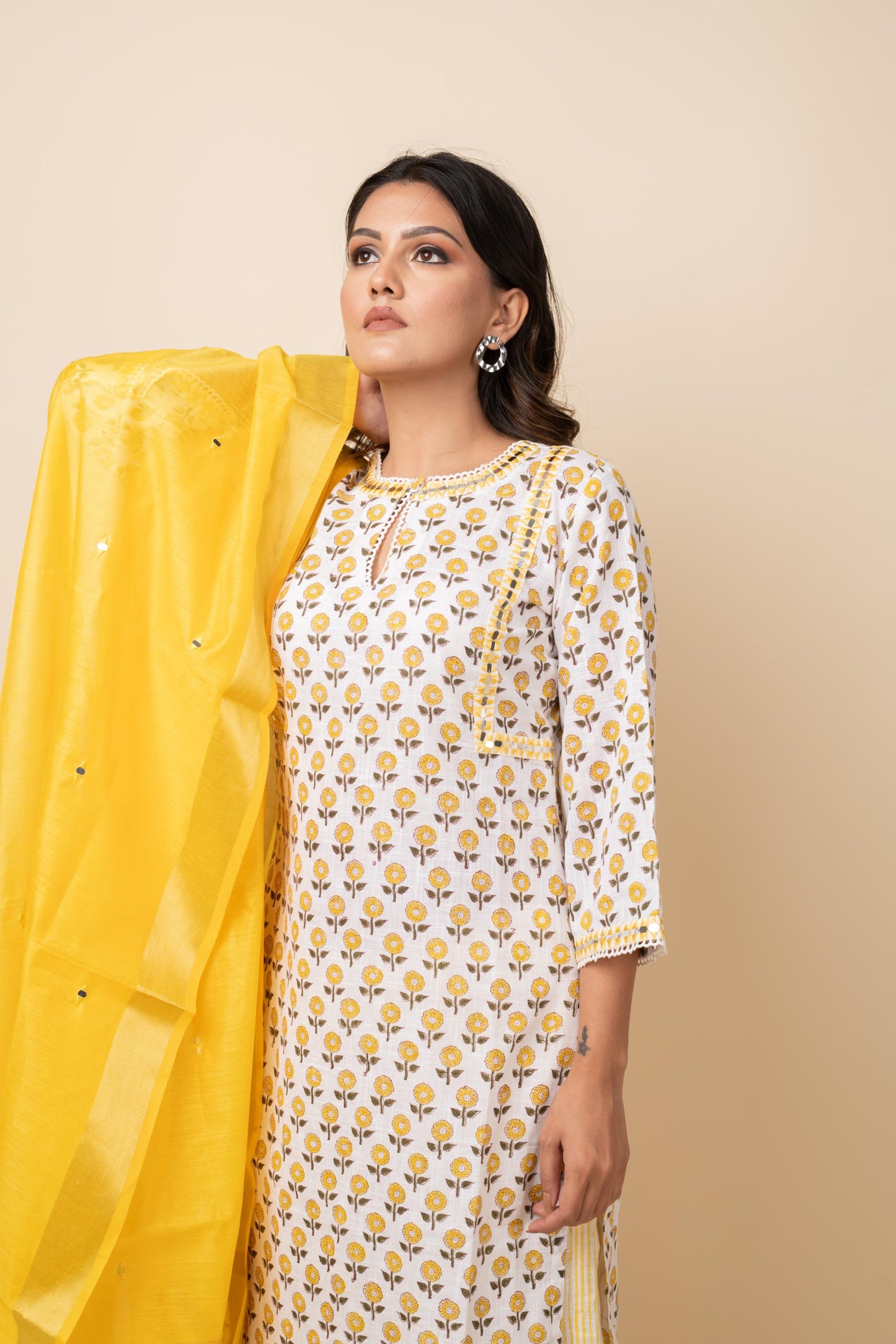 YELLOW PRINTED BUTTI SUIT SET