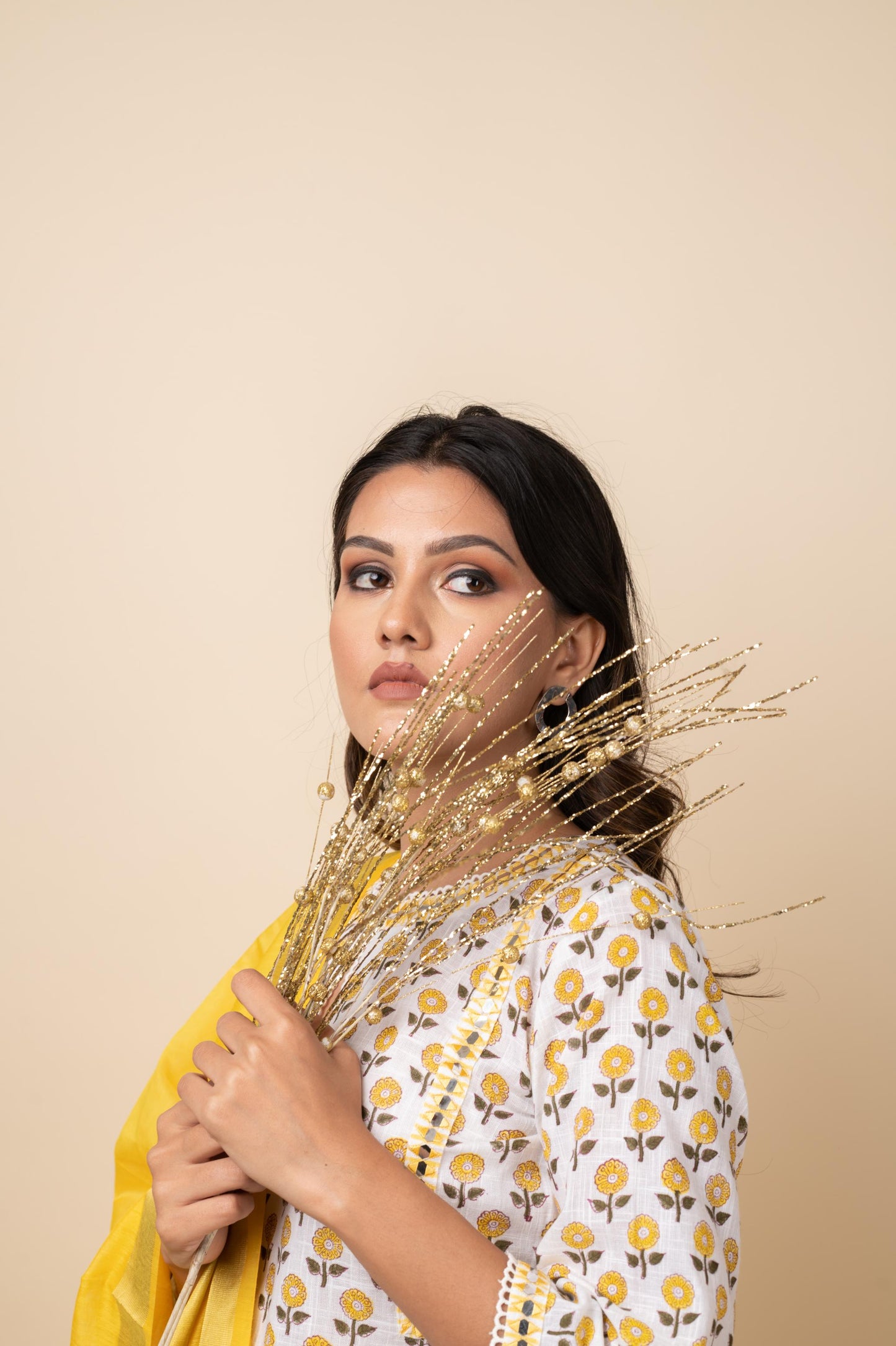 YELLOW PRINTED BUTTI SUIT SET